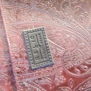 Pair of red Relic bags together